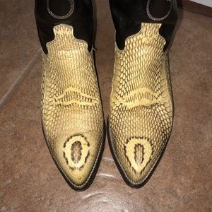 J. Chisholm head cut cobra boots.